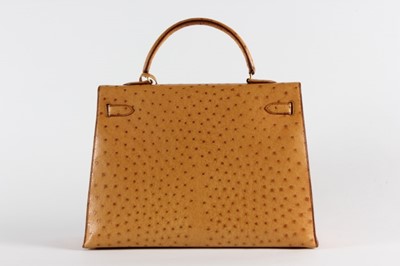 Lot 12 - An Hermès golden-brown ostrich Kelly bag, 1994,...