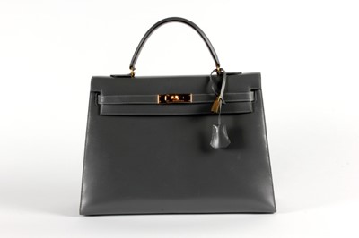 Lot 22 - An Hermès gris tourtourelle box calf leather...