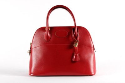 Lot 18 - An Hermès scarlet leather Bolide bag, 1994,...
