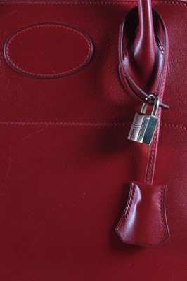 Lot 18 - An Hermès scarlet leather Bolide bag, 1994,...