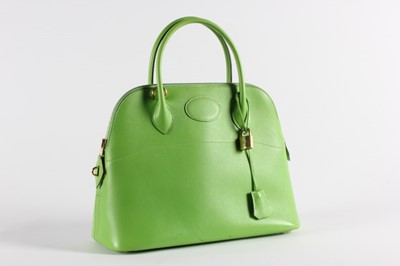 Lot 14 - An Hermès apple-green leather Bolide bag, 1995,...