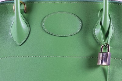 Lot 14 - An Hermès apple-green leather Bolide bag, 1995,...