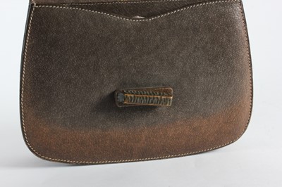 Lot 32 - A Gucci brown pigskin handbag with carved bent-...