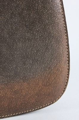 Lot 32 - A Gucci brown pigskin handbag with carved bent-...