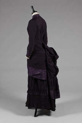 Lot 62 - A dark purple wool and moir silk mourning...