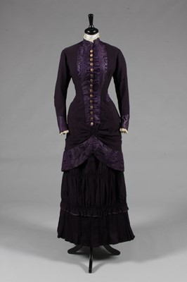 Lot 62 - A dark purple wool and moir silk mourning...