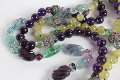 Lot 36 - A carved hardstone, amethyst and fluorite...