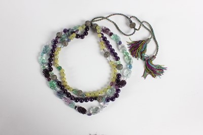 Lot 36 - A carved hardstone, amethyst and fluorite...