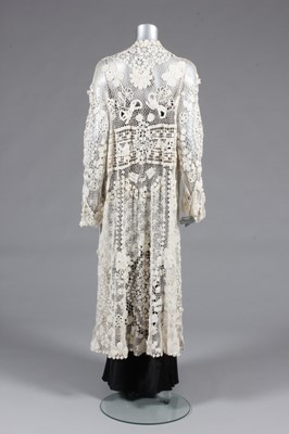Lot 65 - An Irish crochet coat, circa 1910, elaborately...