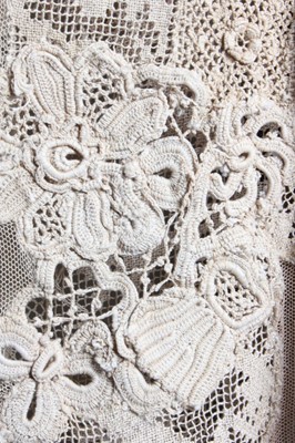 Lot 84 - A 1930s summer gown formed of Edwardian lace,...
