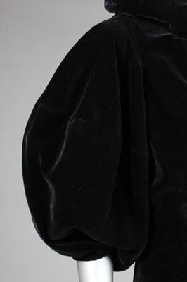 Lot 82 - A Madeleine Vionnet black velvet evening coat,...