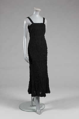 Lot 81 - A Molyneux couture black cloqu-effect chiffon...