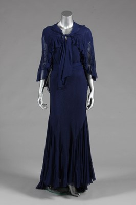 Lot 87 - An early Hartnell couture bias-cut evening...