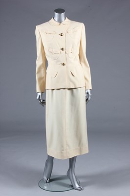 Lot 93 - An Adrian ivory wool suit, late 1940s,...