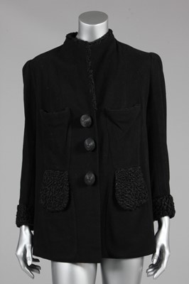 Lot 91 - A rare Elsa Schiaparelli couture black wool...