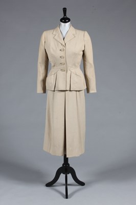 Lot 95 - An Hermès beige linen suit, late 1940s-early...