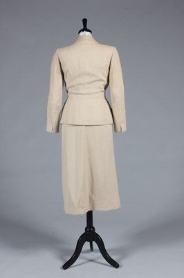 Lot 95 - An Hermès beige linen suit, late 1940s-early...