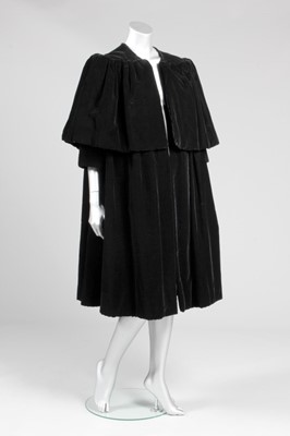 Lot 98 - A Balenciaga couture black velvet redingote,...