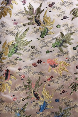 Lot 112 - A Jacques Heim couture oriental brocaded satin...