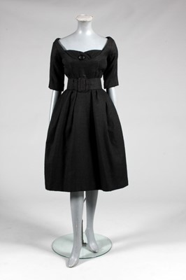 Lot 113 - A Christian Dior London black wool dinner gown,...