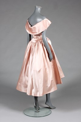 Lot 100 - A Balenciaga couture pink satin evening gown,...