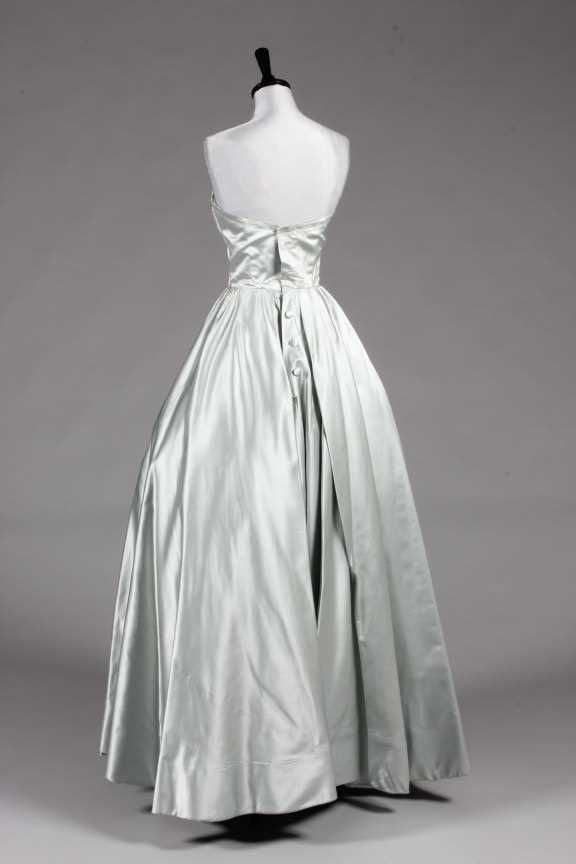 Lot 102 - A Jacques Fath couture ice-blue satin ball