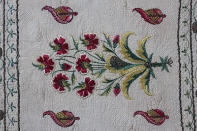 Lot 55 - An embroidered and false quilted panel, Indian,...