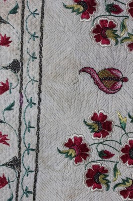 Lot 55 - An embroidered and false quilted panel, Indian,...