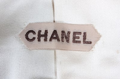 Lot 153 - A Chanel couture black lurex plush cocktail...