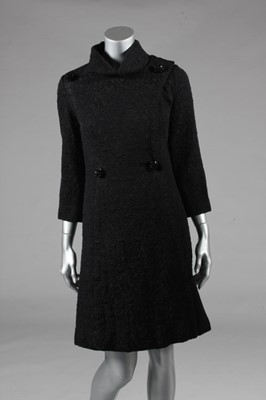 Lot 147 - A Pierre Cardin black cloqué evening coat,...