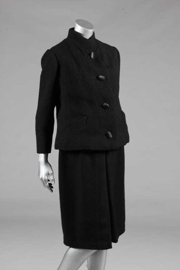 Lot 152 - A Pierre Cardin fur-lined suit, 1960s,...