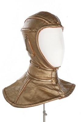 Lot 147 - A rare Thierry Mugler gold leather helmet and...