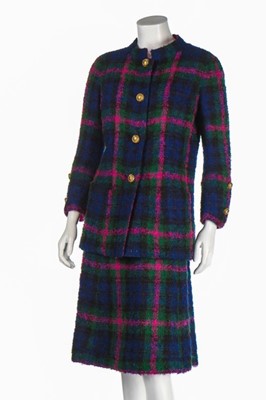 Lot 141 - A Chanel couture tartan tweed suit, 1971,...