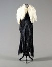 Lot 410 - A beaded and sequinned tulle cocktail dress,...