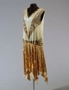 Lot 409 - A beaded and sequinned flapper dress, French...