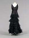 Lot 419 - A Callot Soeurs black satin evening gown with...