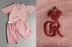 Lot 502 - King George VI's pink silk pyjamas by Hawes &...