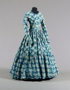 Lot 370 - Four printed gowns, comprising: blue and white...