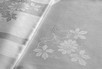 Lot 182 - A damask linen tablecloth, early 20th century,...