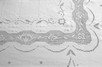 Lot 165 - A large pulled and drawn threadwork banqueting...