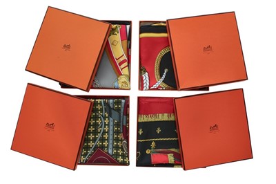 Lot 261 - Four Hermès printed silk scarves, 1980s-2000s,...