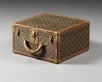 Lot 283 - A Louis Vuitton hard sided suitcase, French,...