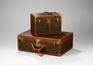 Lot 74 - A good Louis Vuitton hardsided suitcase,...