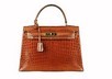 Lot 3 - A good Hermès mid-brown crocodile Kelly bag,...