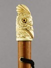 Lot 27 - A lady's umbrella with carved ivory cockatoo,...