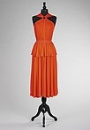 Lot 294 - A Jean Muir tomato red jersey cocktail dress,...