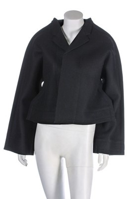 Lot 208 - A Comme des Garçons black felted wool jacket, '...