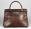 Lot 130 - An Hermès chocolate brown leather Kelly...