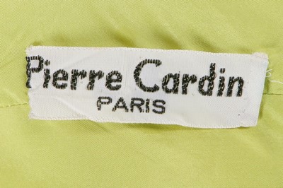 Lot 61 - A Pierre Cardin anise-green silk crpe evening...