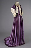 Lot 75 - A good striped purple velvet gown circa 1905,...